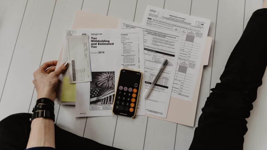 calculator on a phone for understanding budget for first time home buyer georgia