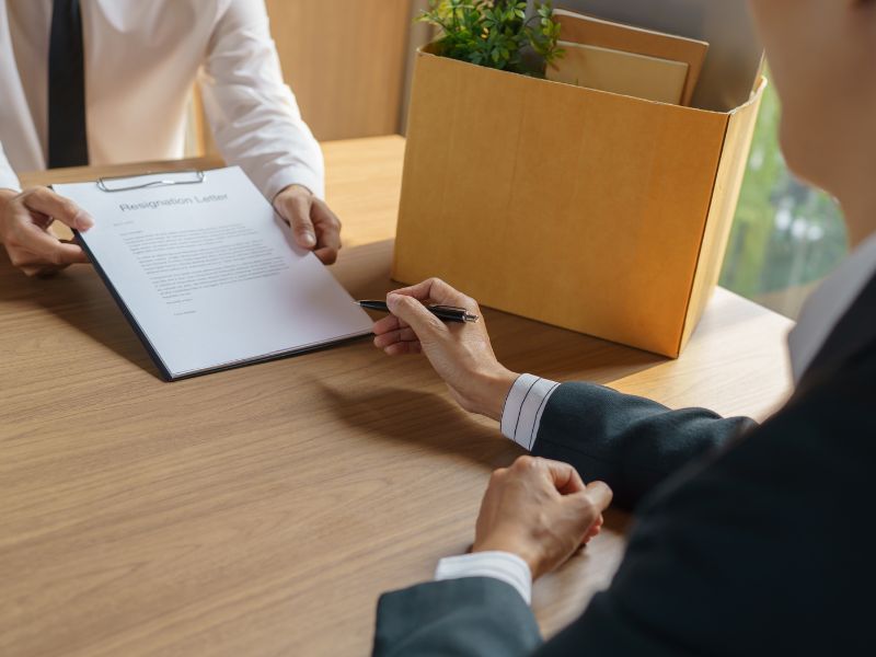 Homeowner reviewing a property valuation document during a home value consultation meeting